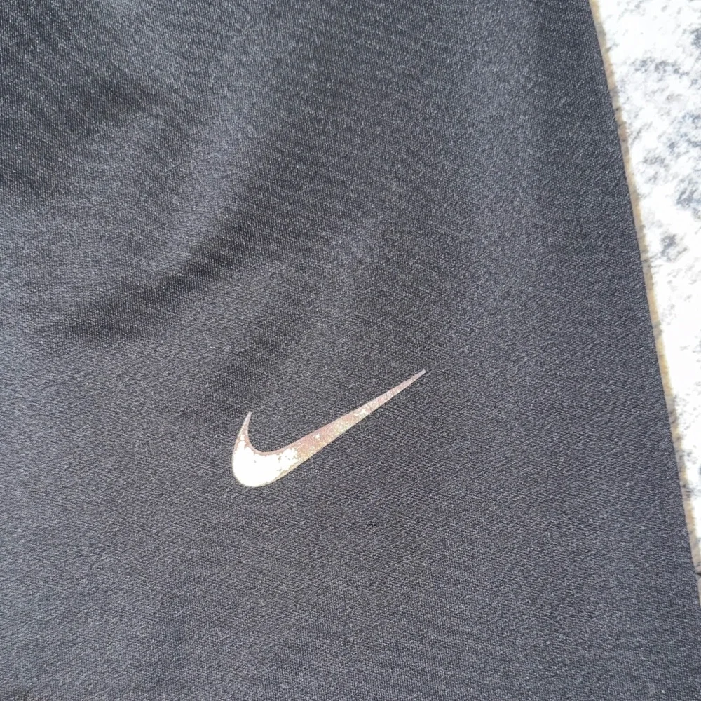 Nike Men's Black Joggers with Silver Logo